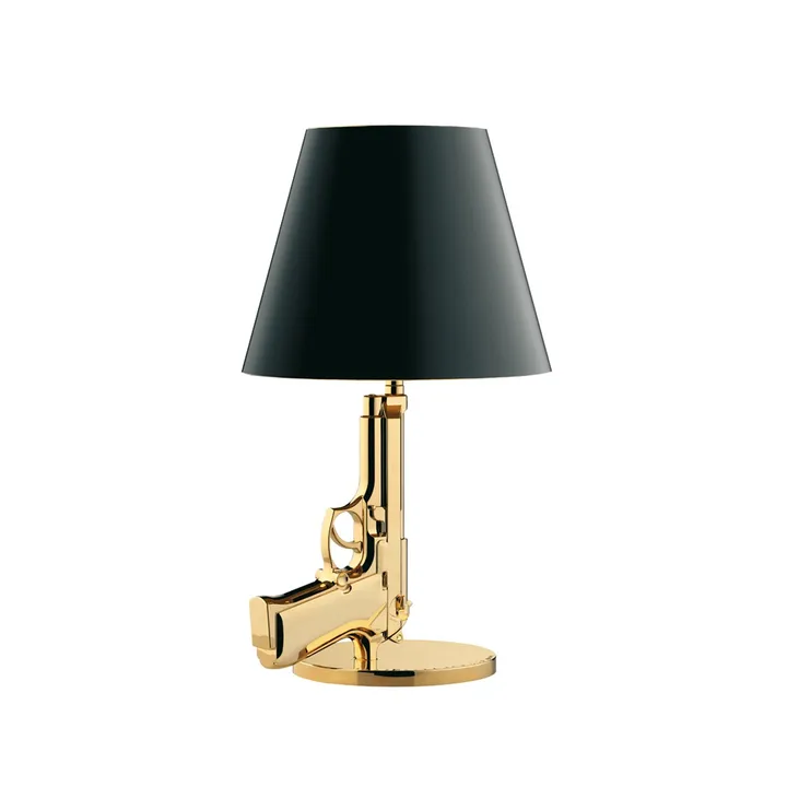 Flos gun bedside lampa hos Designfynd